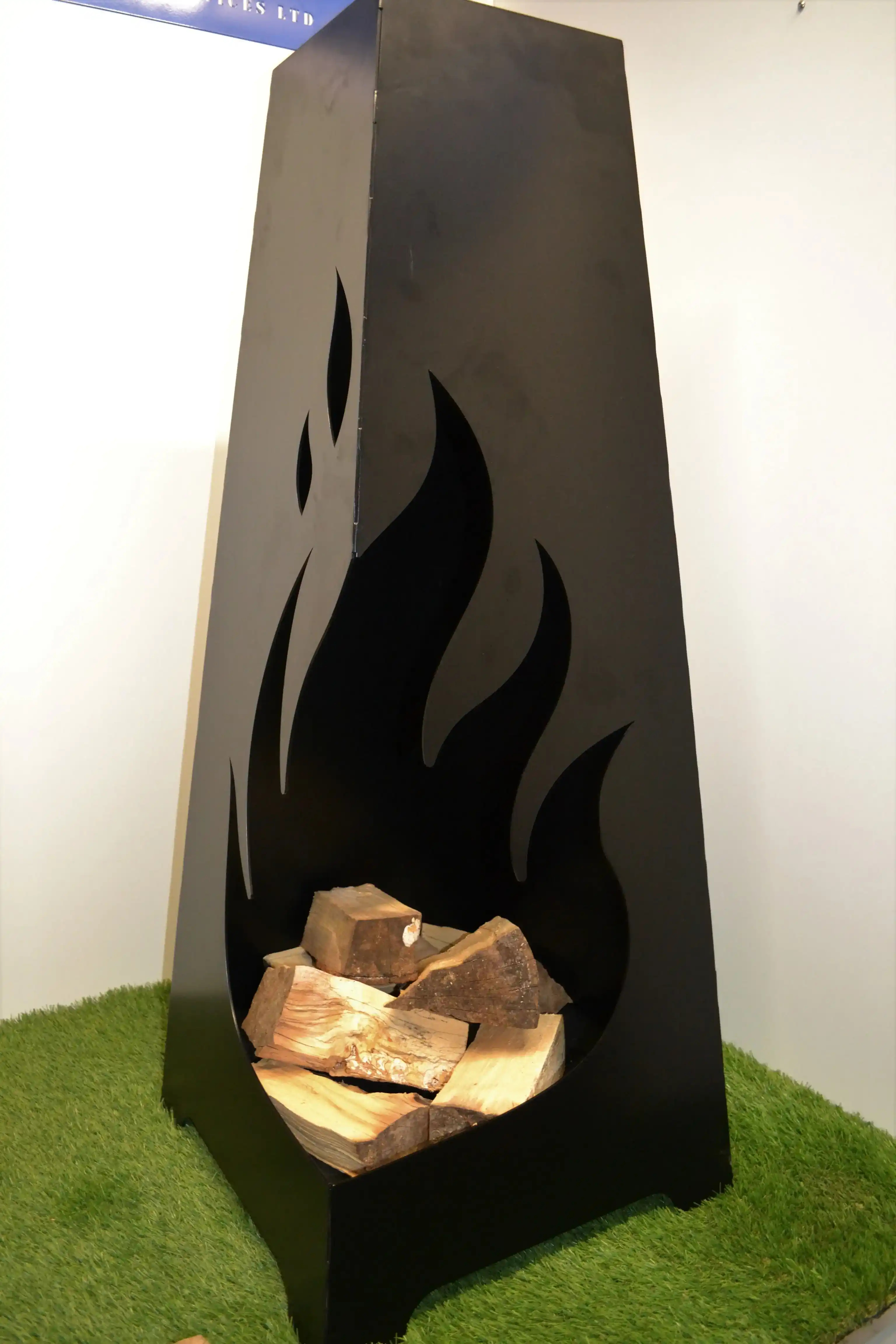 Flame-Design Steel Chiminea manufactured by Techrail Tall outdoor steel chiminea with a decorative laser-cut flame opening.