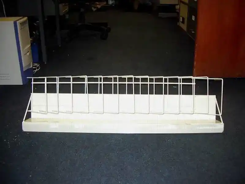 Wire Merchandise Divider Display Tray manufactured by Techrail Powder-coated wire retail tray with individual dividers for organised product presentation.