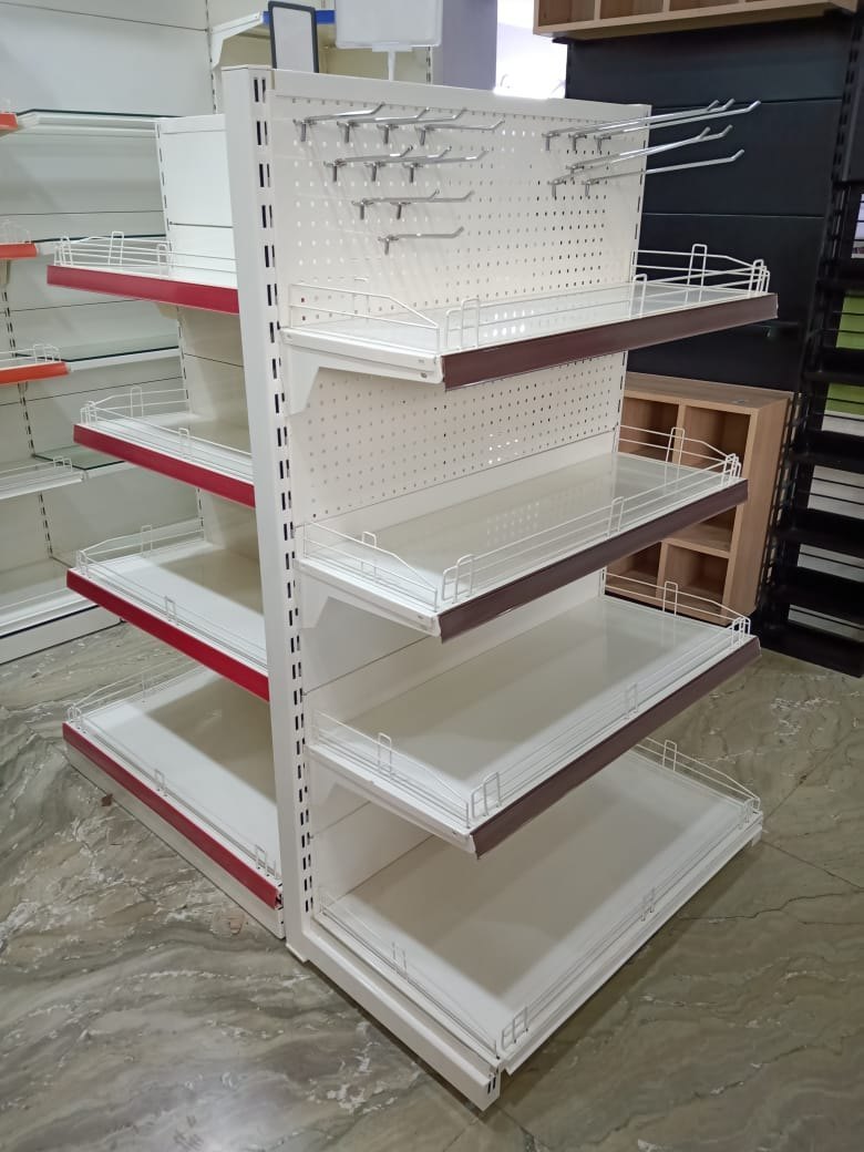 Fabricated Gondola Retail Shelving manufactured by Techrail Shop-floor gondola shelving manufactured with metal uprights and shelves.